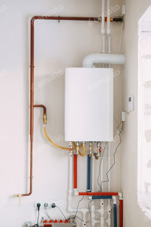 Preview: Installation of a gas boiler with colored pipes equipped with valves and connectors
