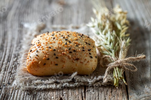 Preview: Healthy and wholegrains oat buns in rustic kitchen.