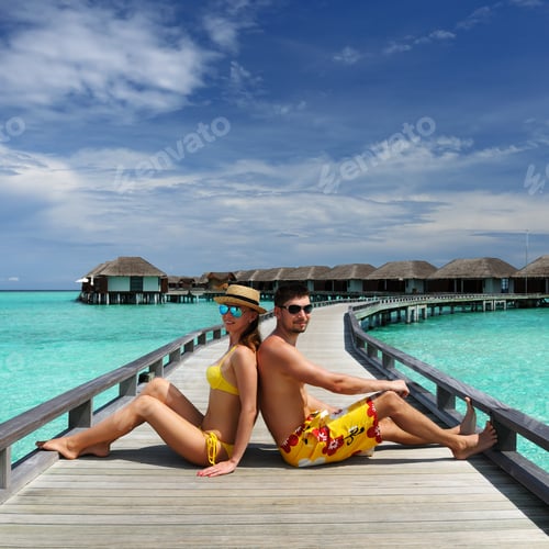 Preview: Couple On A Tropical Beach At Maldives