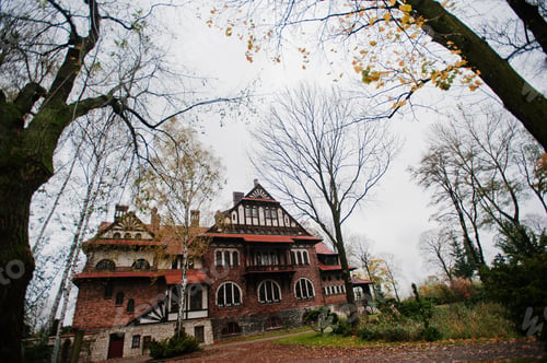 Preview: Old abandoned brick mystic mansion. Gothic building at autumn