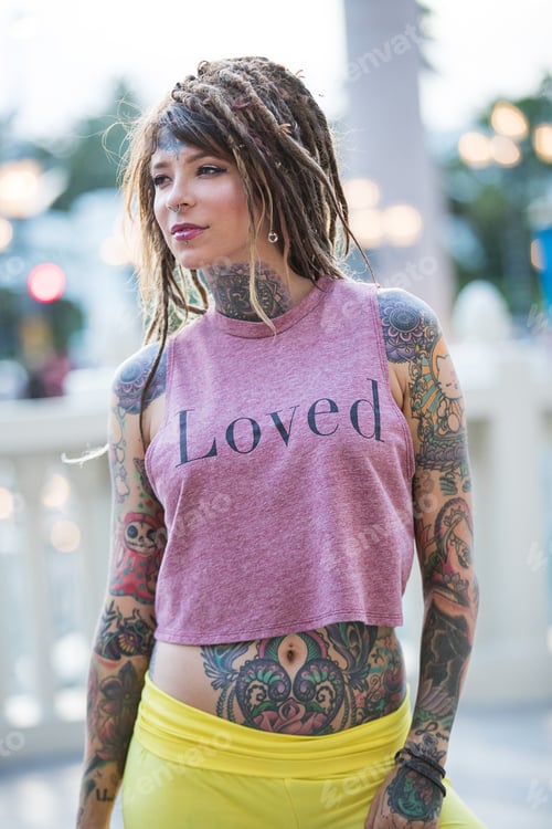 Preview: Beautiful hippie girl with tattoos and dreadlocks
