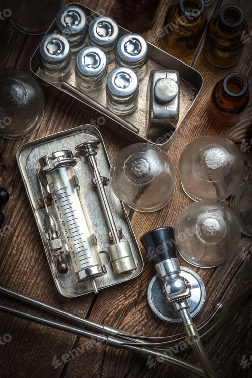 Preview: Vintage Medical Equipment on Rustic Wooden Table