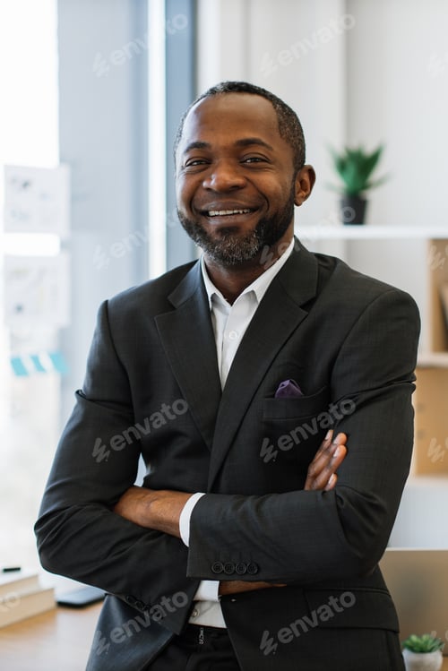 Preview: Smiling Businessman Arms Crossed
