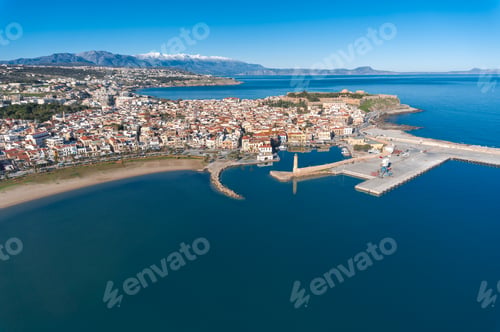 Preview: Coastline with an island, mountains, and blue water