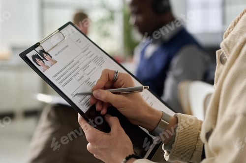 Preview: Woman working in services office consulting male client
