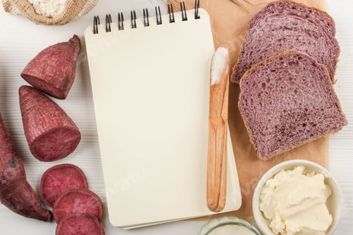 Preview: Top View Composition of Slice Homemade Purple Bread Made from Japanese Purple Sweet Potato