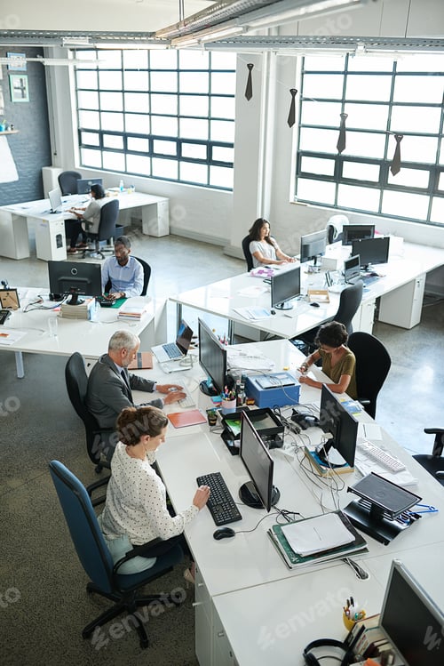 Preview: Shot of a group of coworkers sitting at their workstations in an office