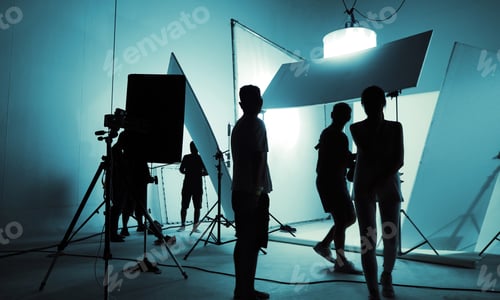 Preview: High Contrast silhouette images of production crew team working in photo shooting studio and LED hea
