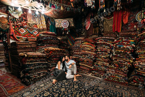Preview: Couple having fun. Couple in love in Turkey. Man and woman in the Eastern country. Gift shop
