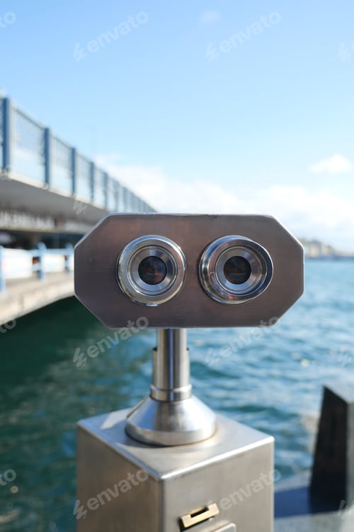 Preview: These coinoperated binoculars provide a perfect view overlooking the beautiful water