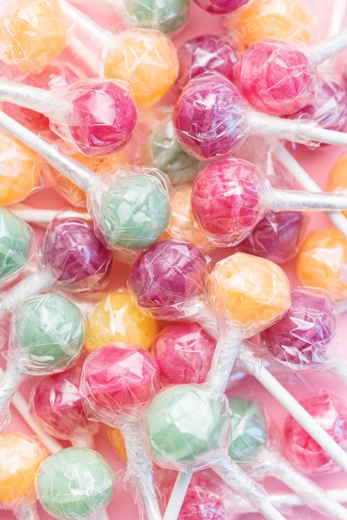 Preview: Sweet lollipops on pink background