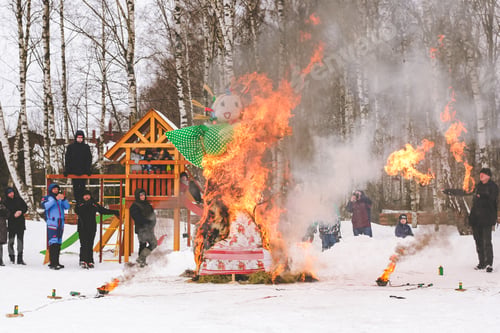 Preview: Fire show performance on Russian ethnic carnival Maslenitsa- Pancake week. Burning Maslenitsa doll