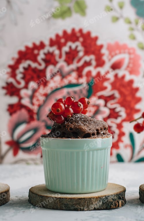 Preview: Chocolate cakes in the cup with currants and sugar glass.