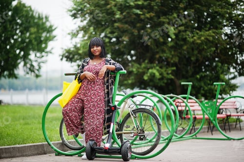 Preview: African american woman using segway or hoverboard