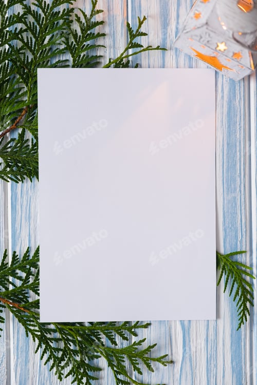 Preview: Mockup Christmas greeting card and gifts on blue wooden background. Template for seasonal greetings.