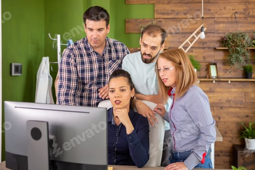 Preview: Young colleagues having a conversation with their female manager