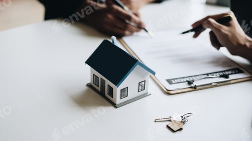 Preview: Real estate agent talked about the terms of the home purchase agreement.