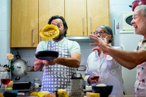 Preview: Funny family in the kitchen cooking eggs