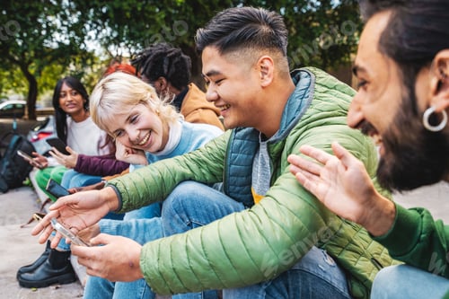 Preview: Diverse Gen Z Friends Sharing Content on Smartphone Outdoors
