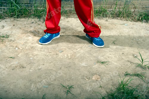 Preview: Low Section Shot Of Teenage Boy Wearing Casual Clothing