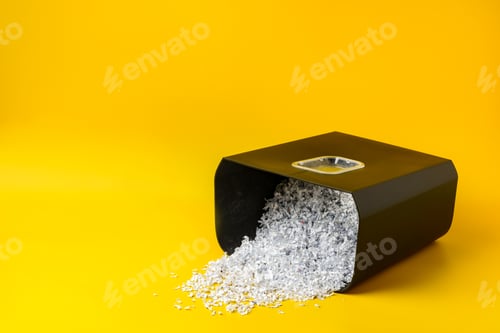 Preview: Shredded white paper on light yellow background