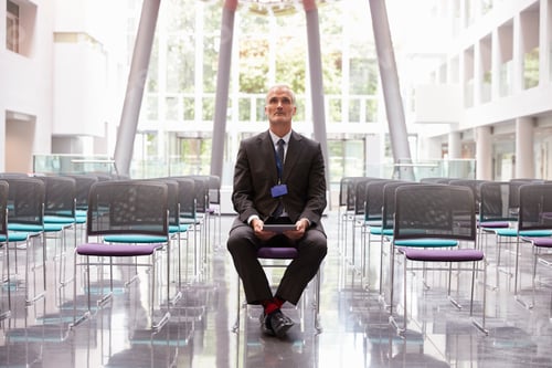 Preview: Businessman In Empty Auditorium Preparing To Make Speech