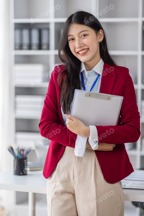 Preview: Young asian woman, professional entrepreneur standing in office clothing, smiling and looking confid