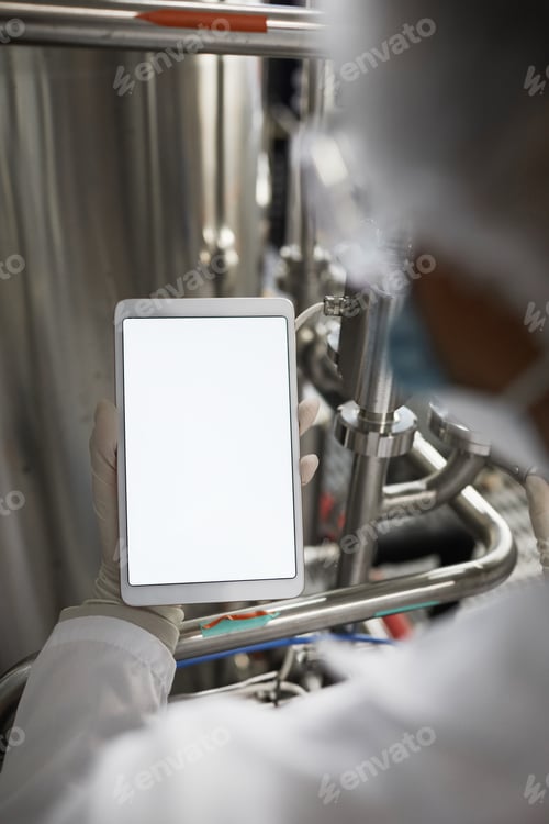 Preview: Worker Holding Digital Tablet at Factory Mock Up
