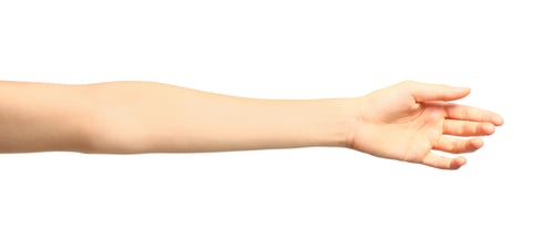 Preview: Young woman showing hand on white background, closeup