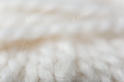 Preview: full frame of white knitting texture as backdrop