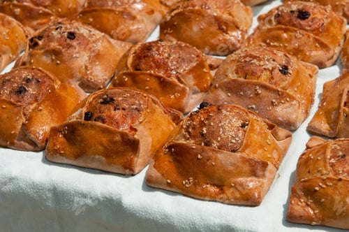 Preview: Cypriot easter pastries made with mixture of various cheese and halloumi, flaounes