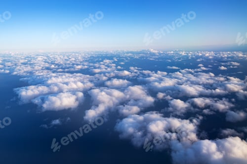 Preview: Close-up. Rare white fluffy clouds, top view, in the evening sky