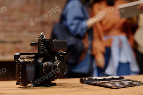 Preview: Recording Setup with Modern Camera Equipment on Table