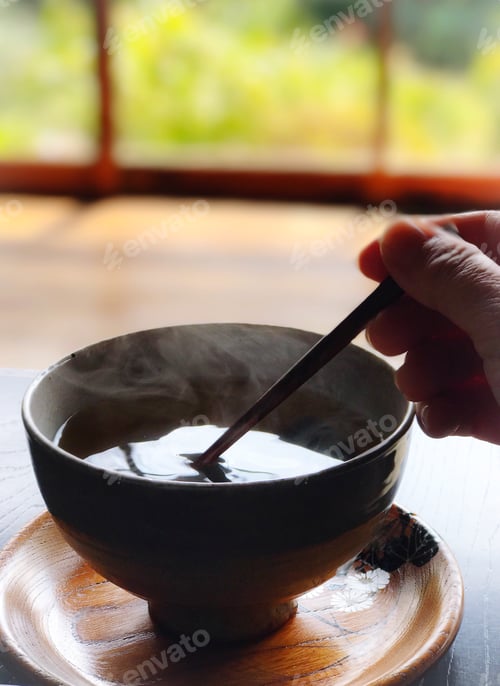 Preview: Focus on a cup of warm tea