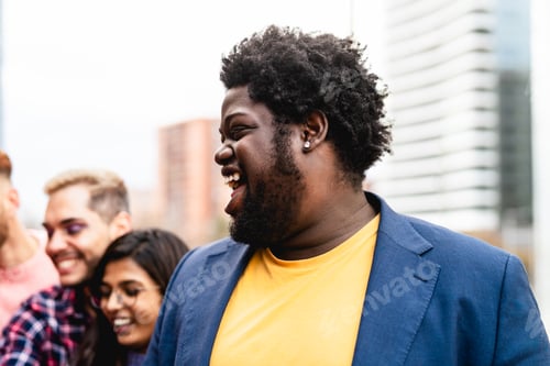 Preview: Young multi ethnic friends having fun together hanging out in the city