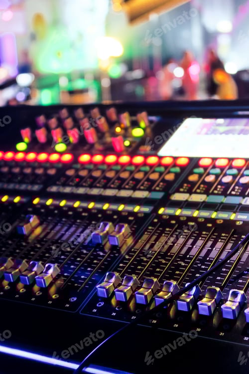 Preview: Audio Sound Mixer with Glowing Lights in Venue