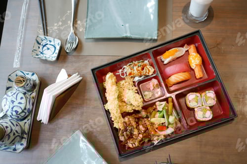 Preview: sushi and traditional japanese food on table with copy space,