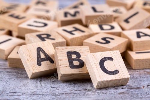 Preview: Wooden alphabet on the wooden table