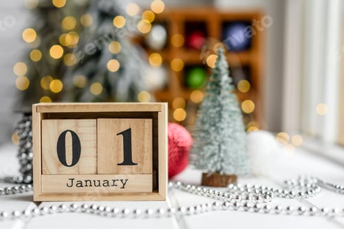 Preview: Beautiful multi-colored Christmas decorations on a light wooden table