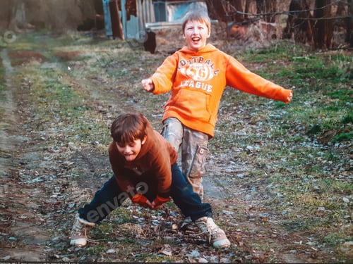 Preview: Two boys fool around in the backyard during quarantine