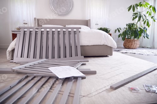 Preview: Instructions And Components For Self Assembly Baby Cot On Bedroom Floor