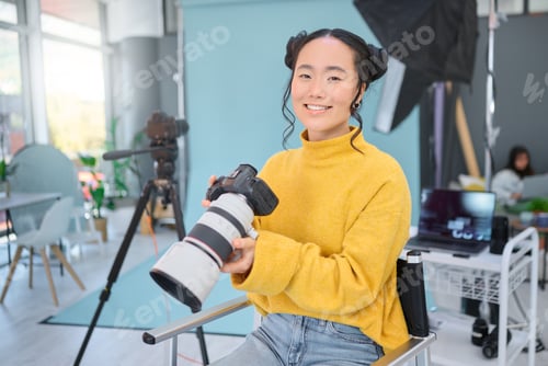 Preview: Happy, photoshoot and portrait of a photographer with a camera for production, video and media. Cre