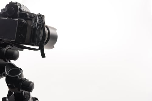 Preview: black professional digital camera isolated on white