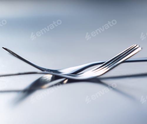Preview: Two forks side by side symbolizing togetherness, dependency and unity. A symbol of teamwork, relati