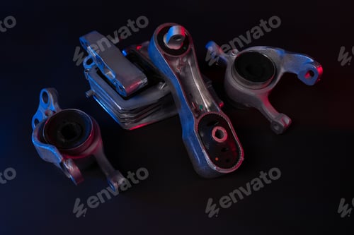 Preview: new car suspension detail, silent block on a black background