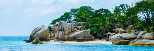 Preview: white tropical beach with huge boulders and palm trees Coco Island Tropical Seychelles Islands