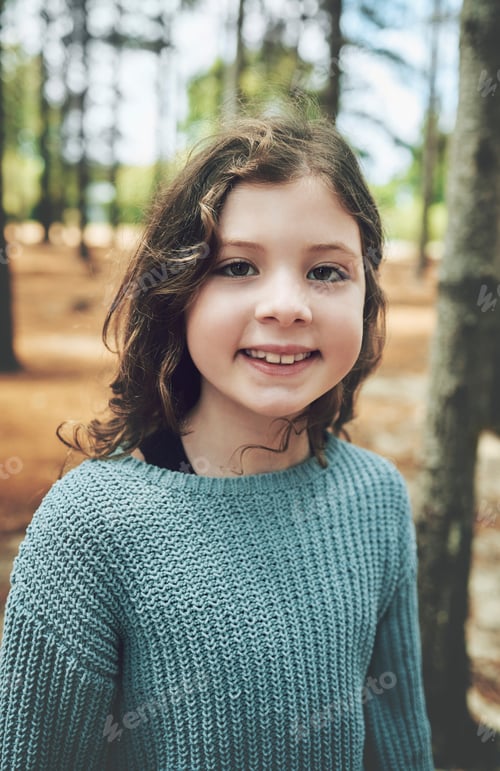 Preview: Nature, happiness and portrait of child in forest with smile on face enjoy hiking trail in woods. F