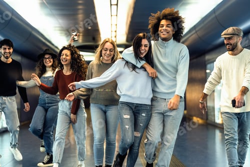 Preview: Happy young friends hanging out in subway underground metropolitan