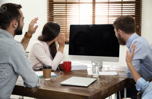 Preview: Group of colleagues using video chat on computer in office. Space for text