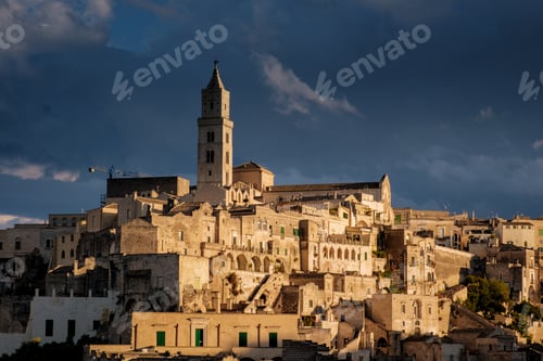 Preview: Exploring the ancient sassi of Matera under dramatic clouds at sunset in Puglia, Italy